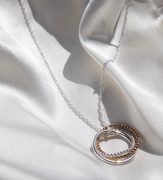 Stunning Sterling Silver and gold filled interlinked ring necklace. Personally handmade with care.