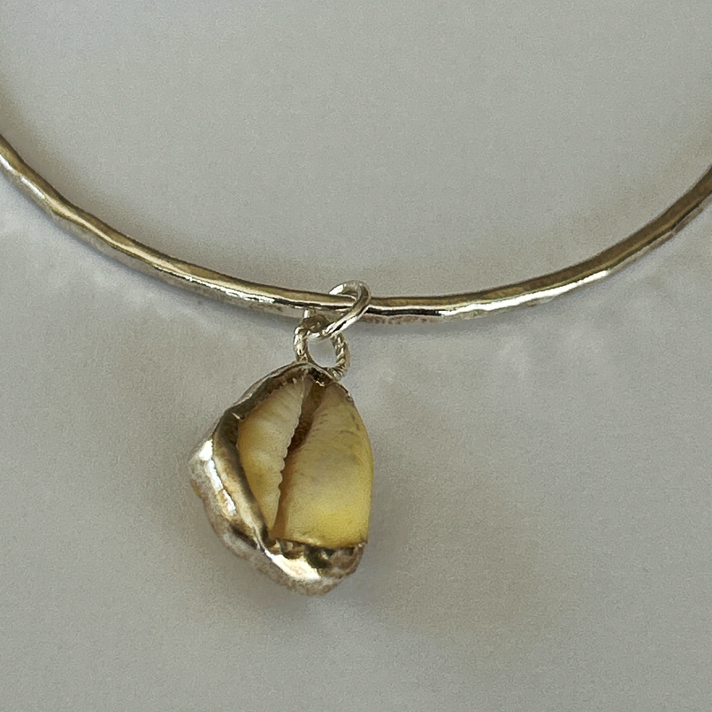 Silver Bangle With Cowrie Shell Charm - Silver Lines Jewellery