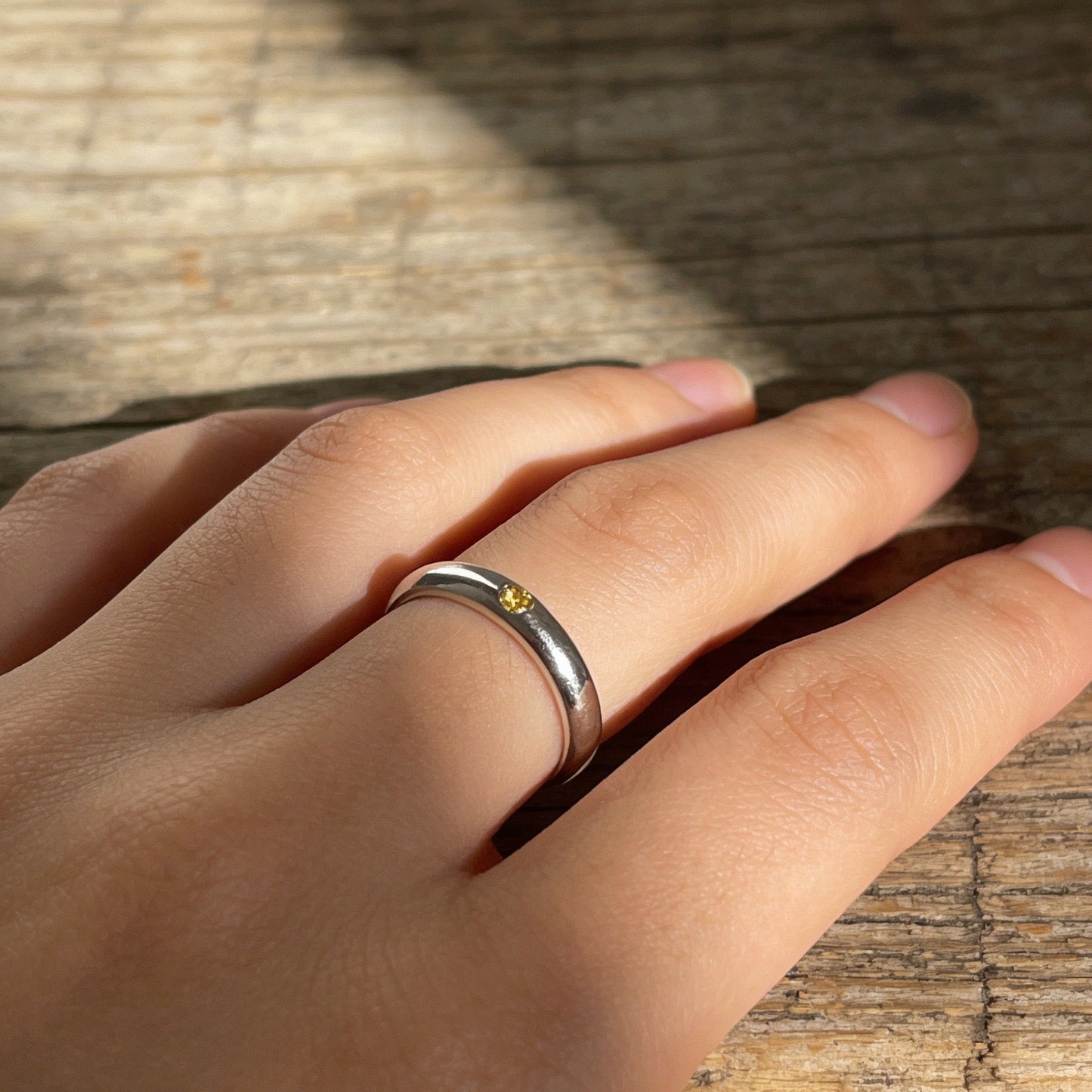 Silver Flush Set Ring With faceted  Gems