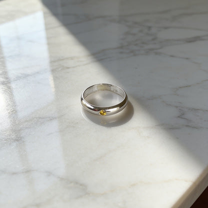 Silver Flush Set Ring With faceted  Gems